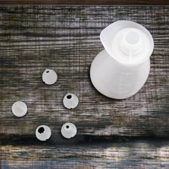 Flacon Souple Verseur En Silicone Avec 5 Douilles -Cuisine Soldes Magasin 51055 4 6 Flacon souple verseur en silicone avec 5 douilles Mathon